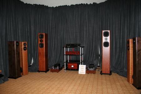 RAW Acoustics room at the Rocky Mountain Audio Fest 2007: tower speakers in wood veneers either side of an equipment rack